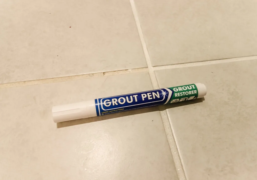 grout pen on dirty and clean tile grout