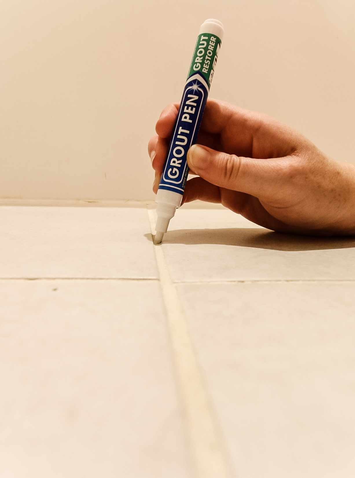 using a grout pen on tile floor grout