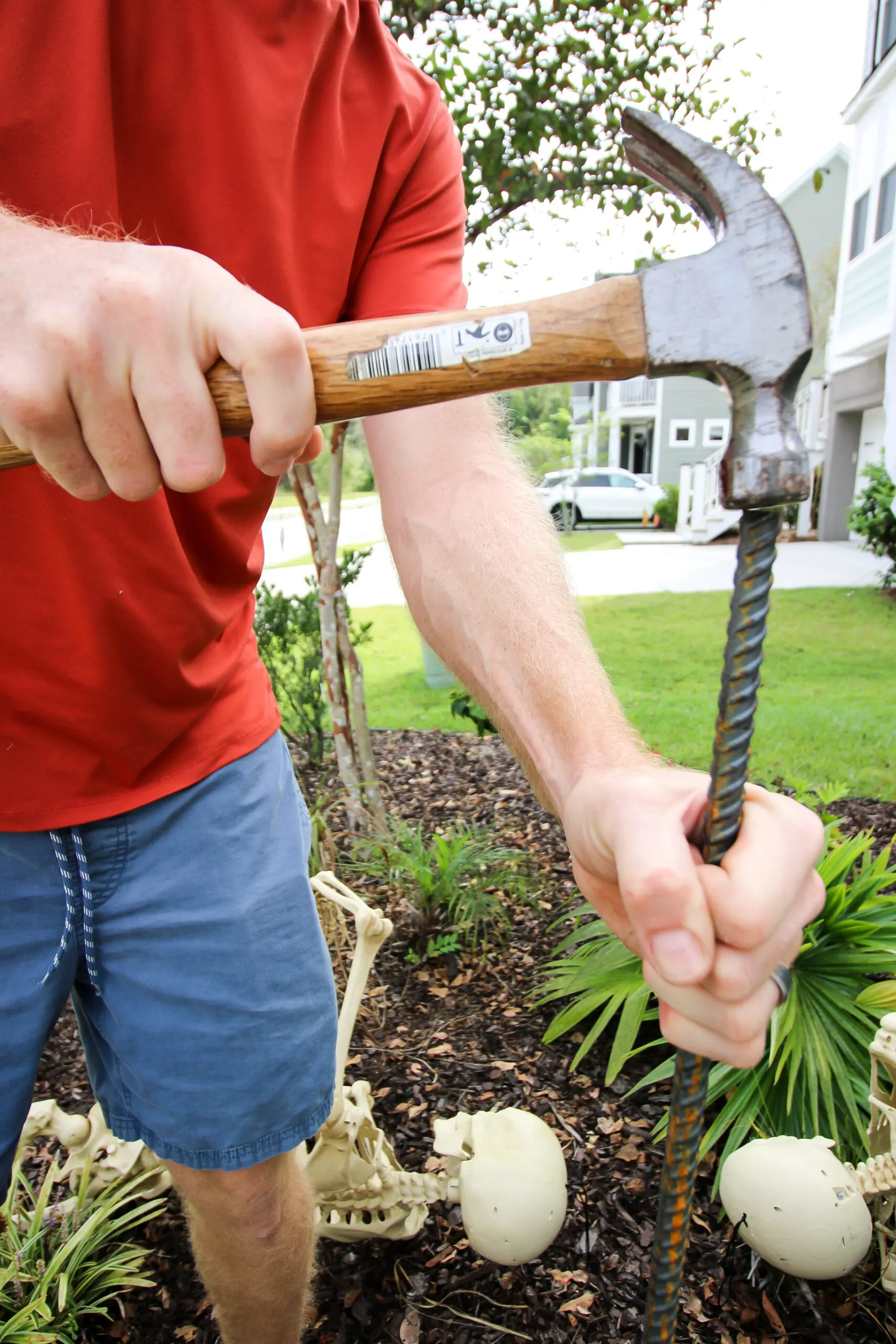 hammering rebar into the ground