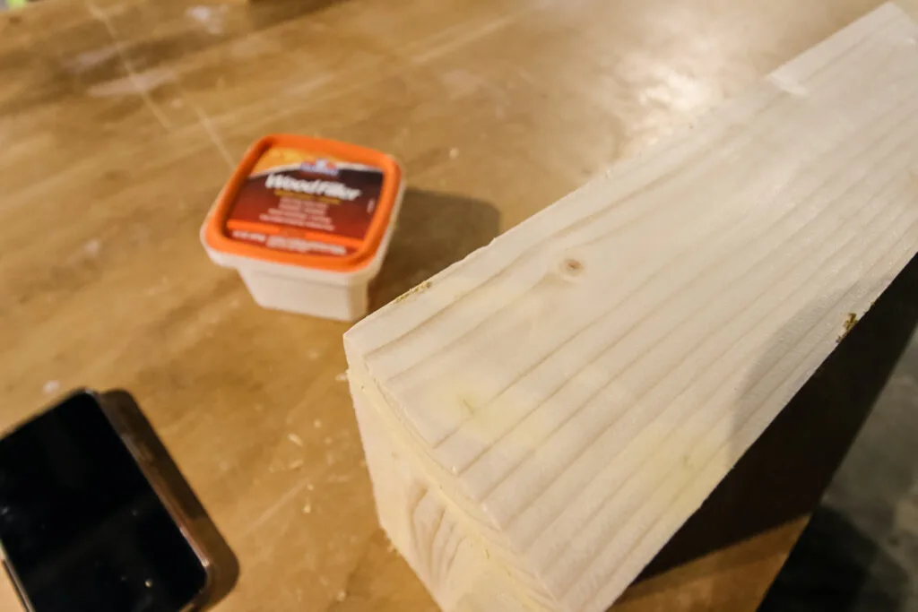 Adding wood filler to floating shelves 