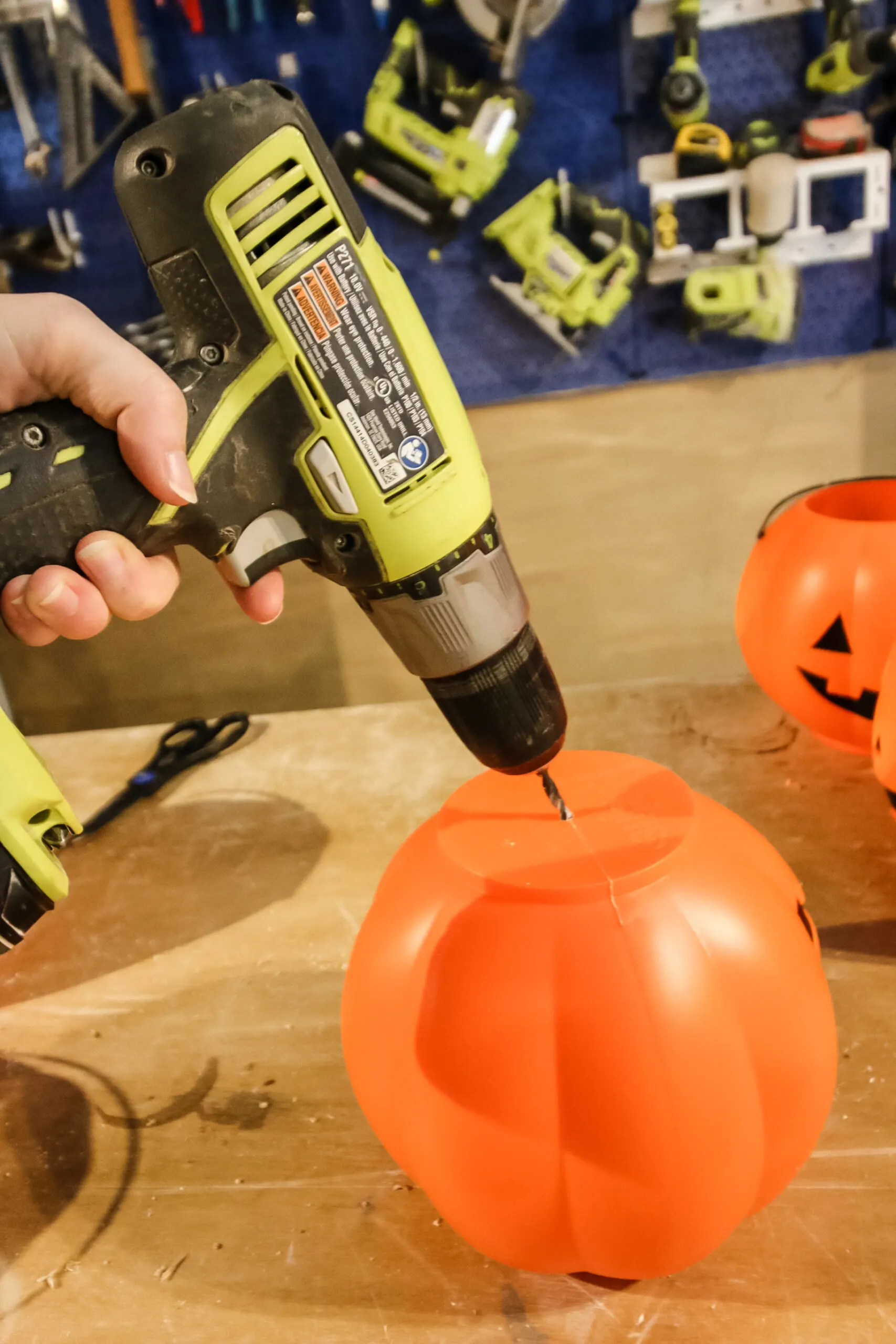 drilling hole into plastic pumpkin