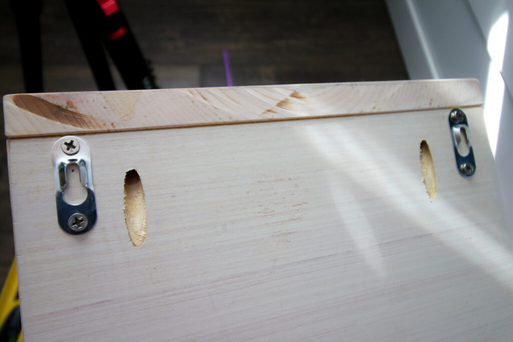 keyhole brackets on floating nightstand