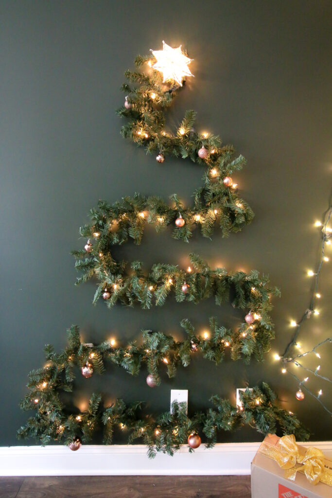 Christmas garland tree on the wall