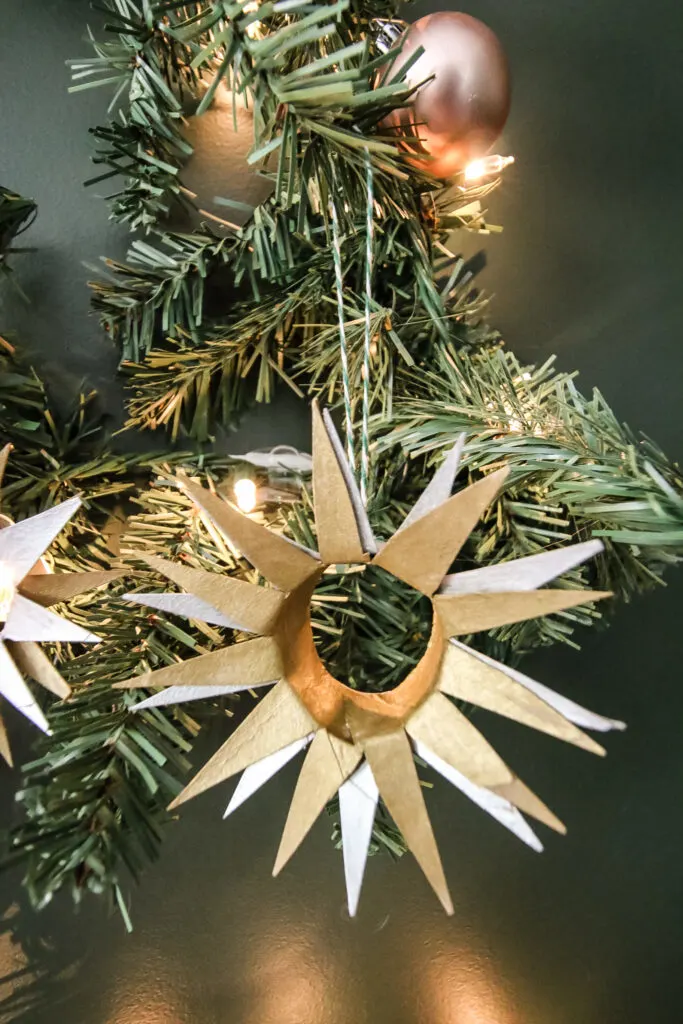 starburst christmas ornament made from a toilet paper roll