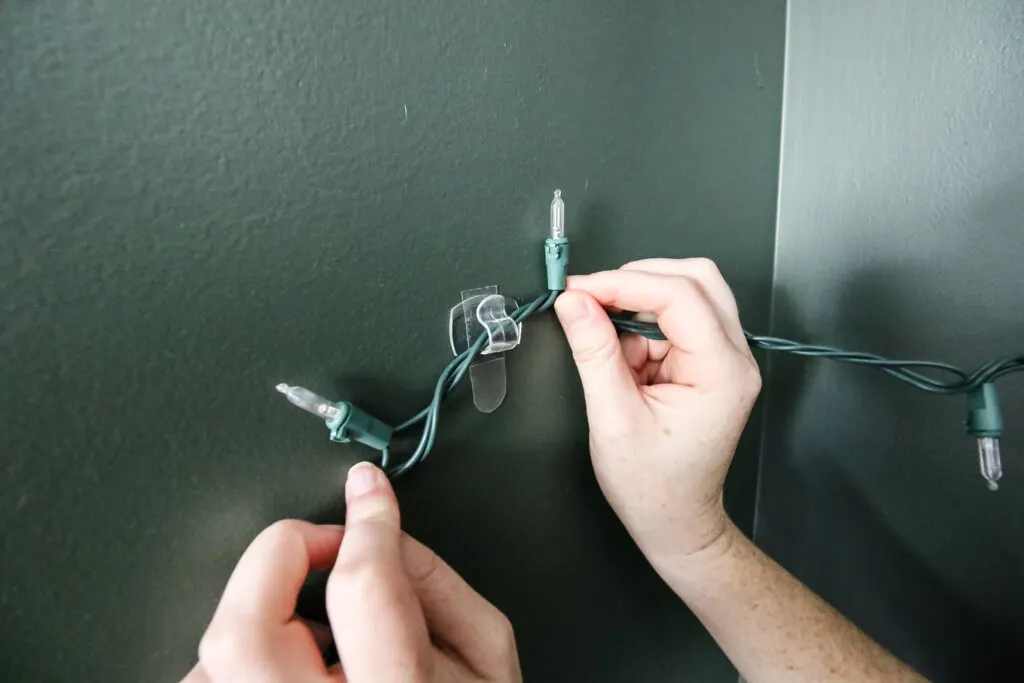 hang christmas lights on the wall