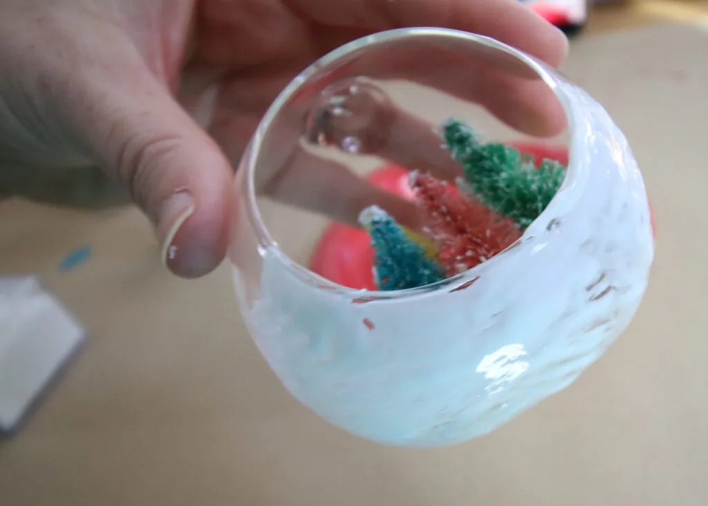 white glue on a glass ball ornament