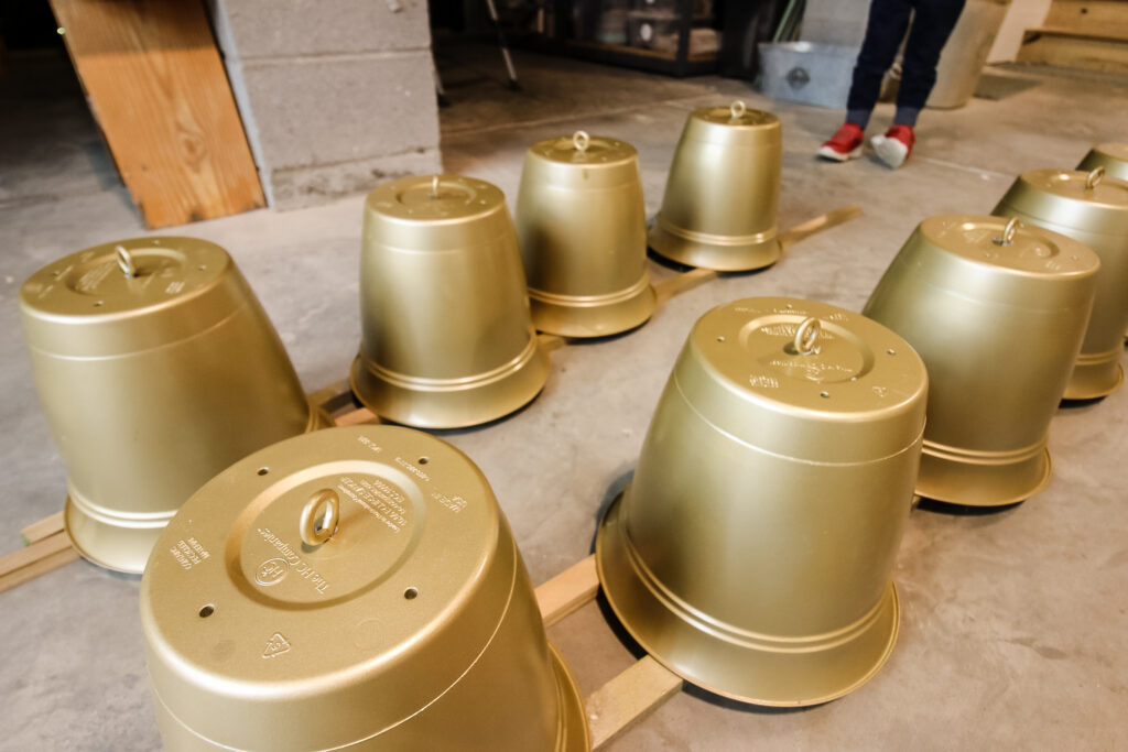 Gold pots with eye hook bolts installed