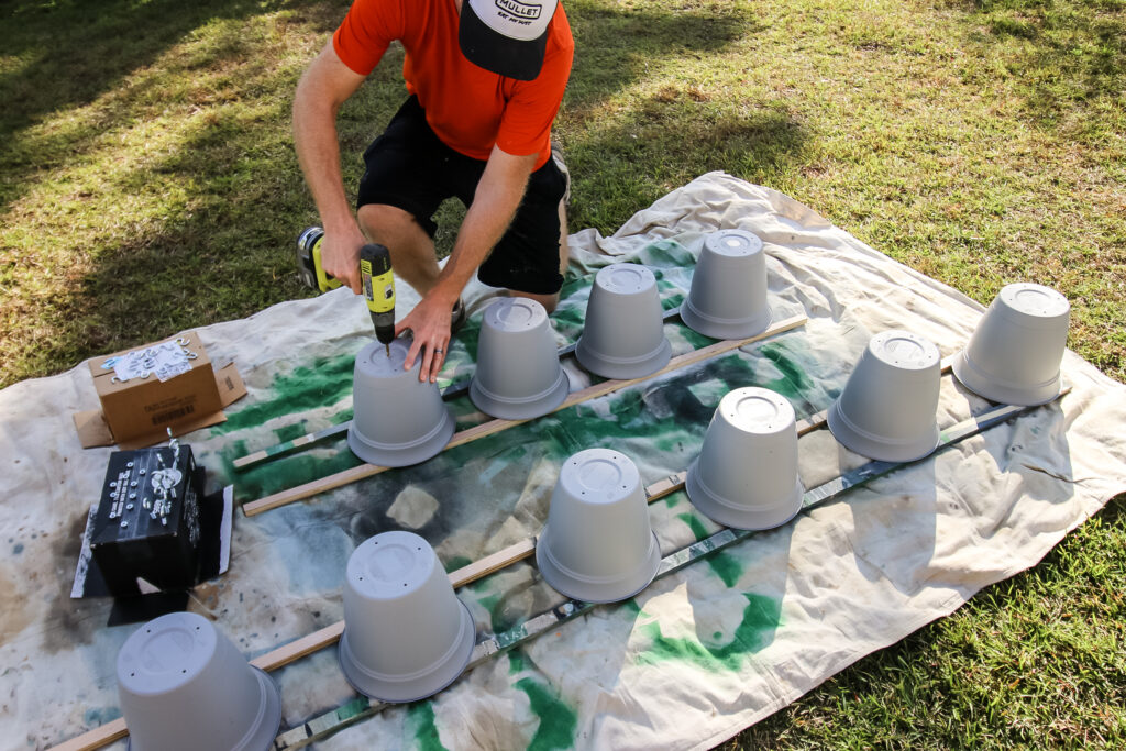 Drilling holes in pots for jingle bells