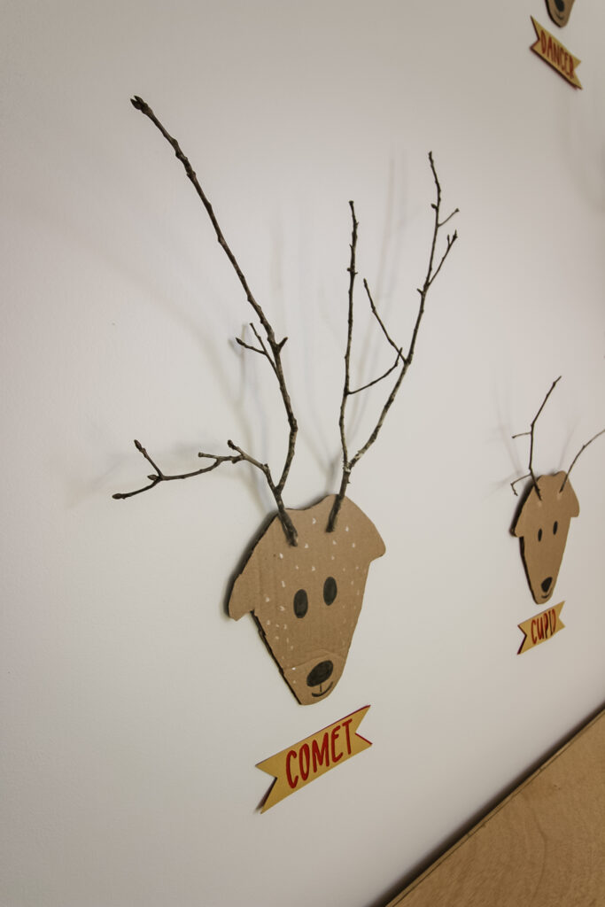 Cardboard reindeer wall display