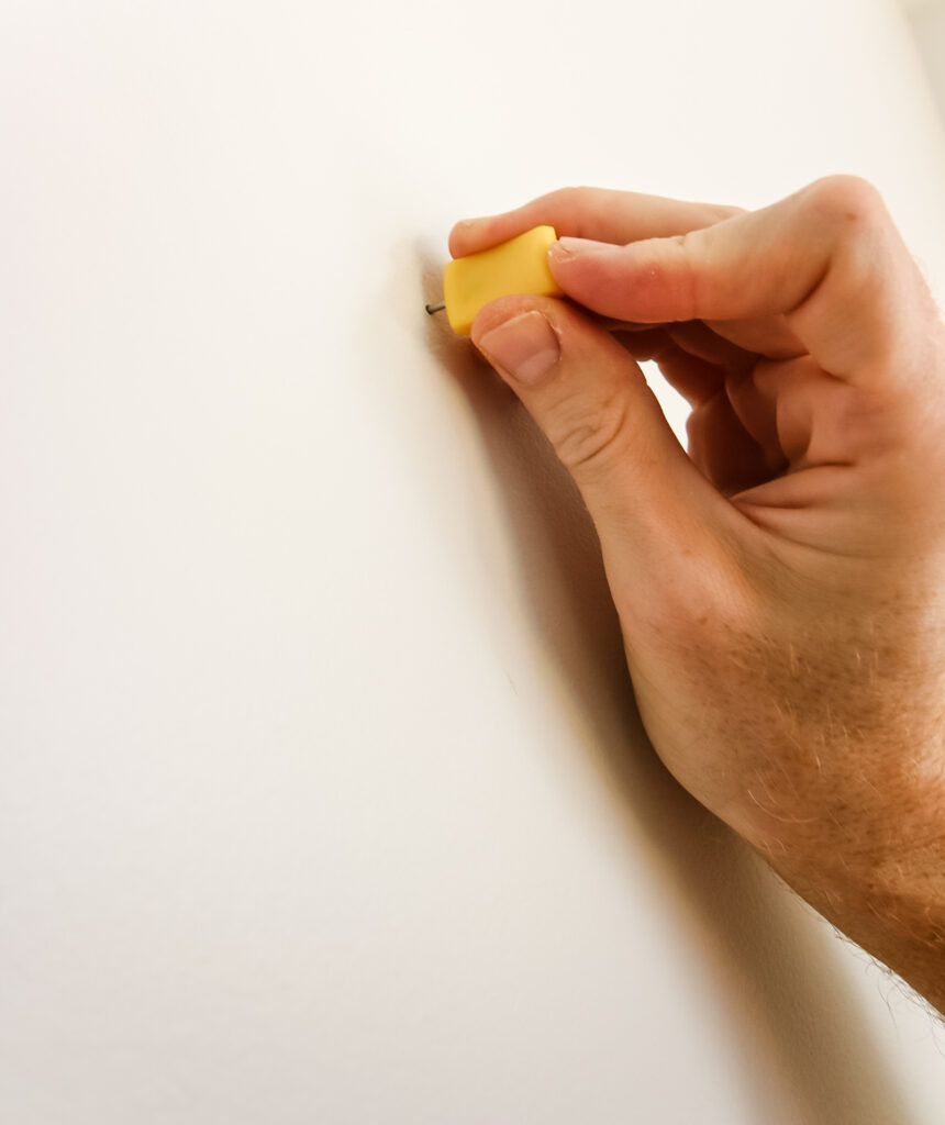 poking hole in wall