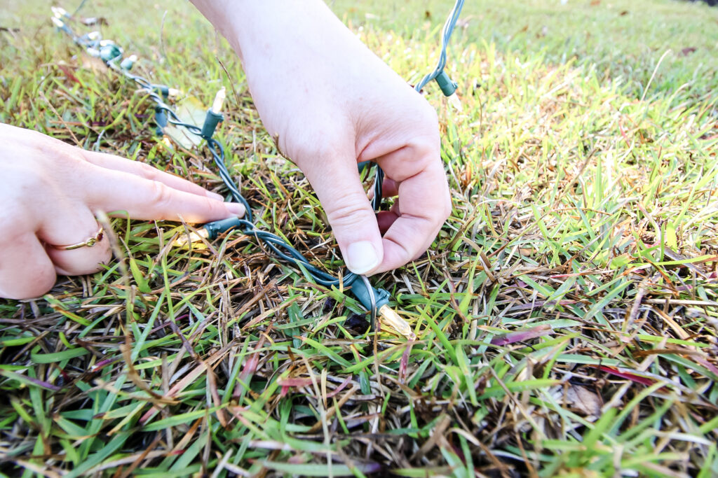 Using landscaping stakes on string lights