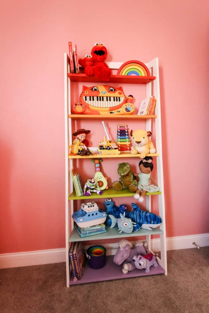 Completed DIY angled ladder toy shelf