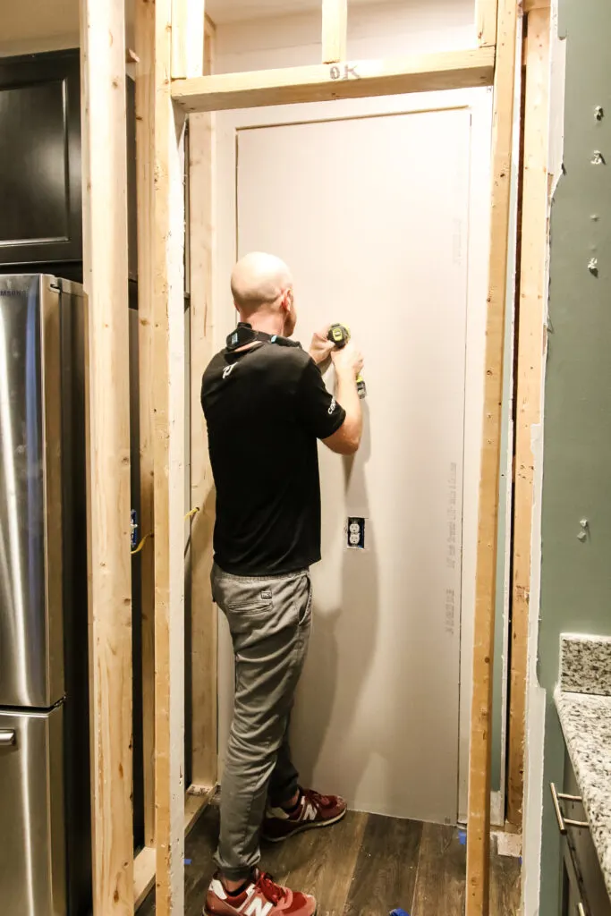 Securing drywall to stud