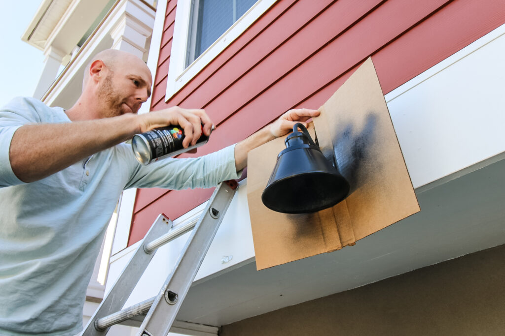 spray painting an outdoor light fixture