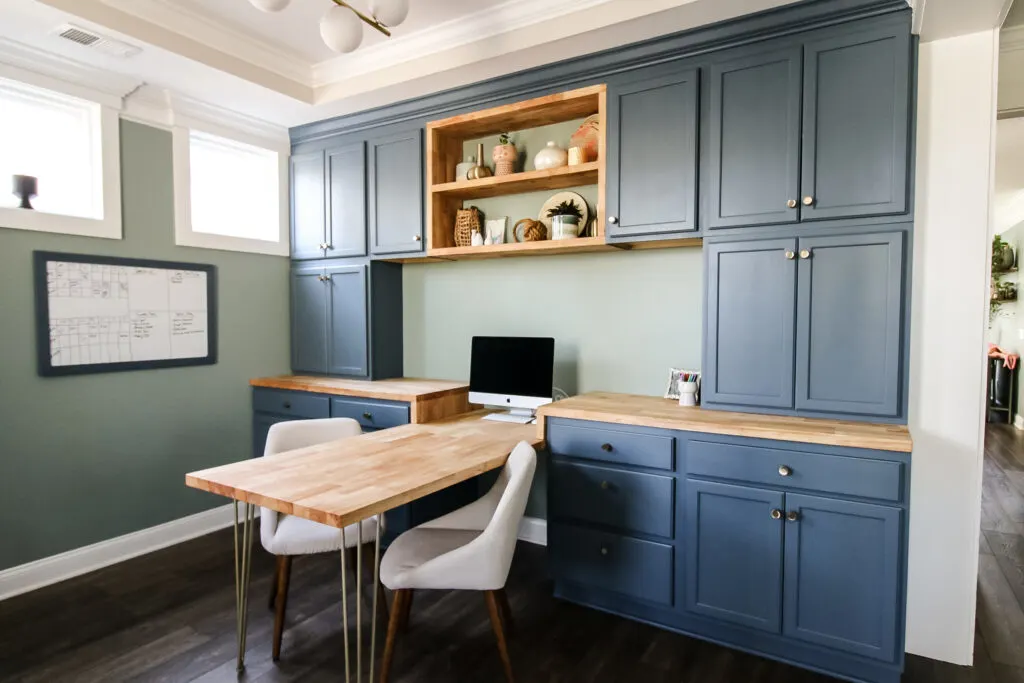 Butcher block floating shelves in home office built ins