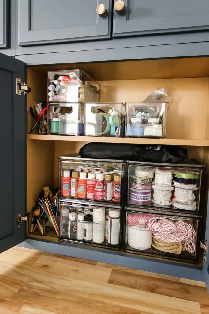 craft supplies in a cabinet
