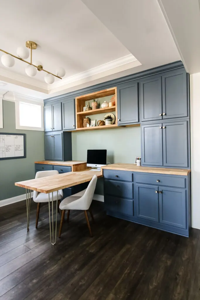 Wide view of DIY home office with butcher block desk