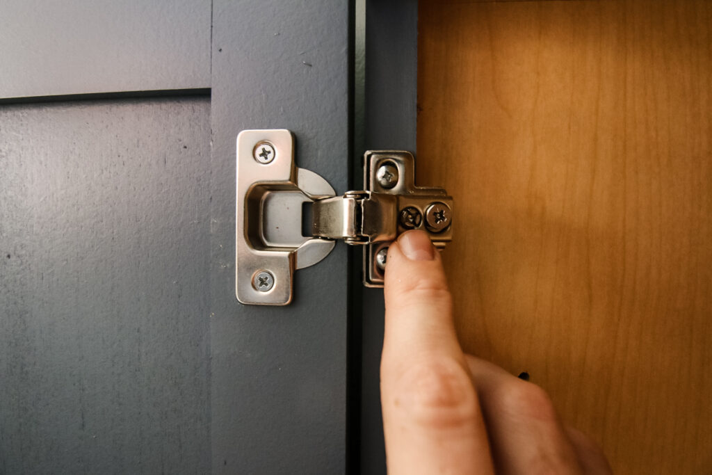 Screw to adjust cabinet door in and out