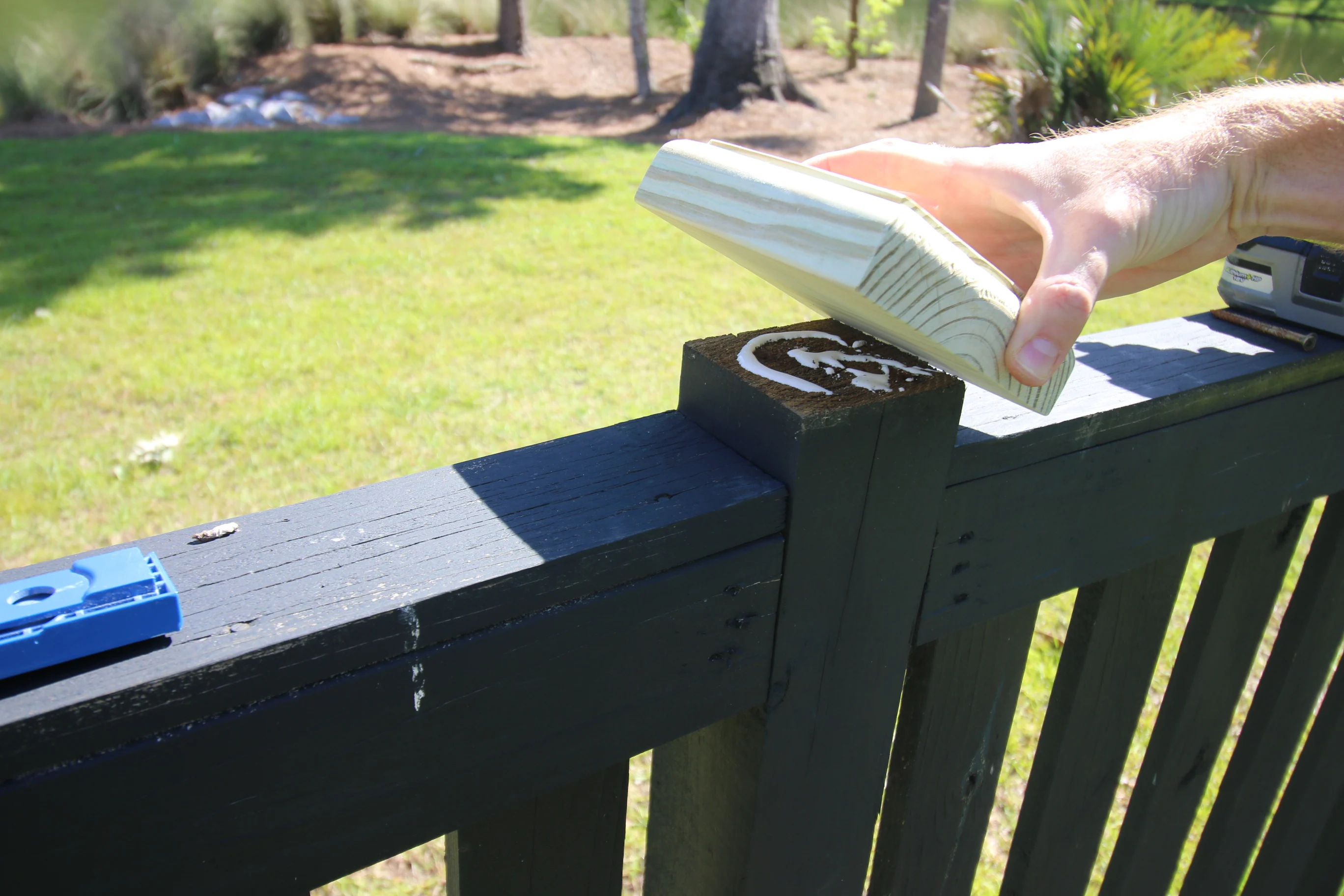 Gluing new fence post caps to fence posts