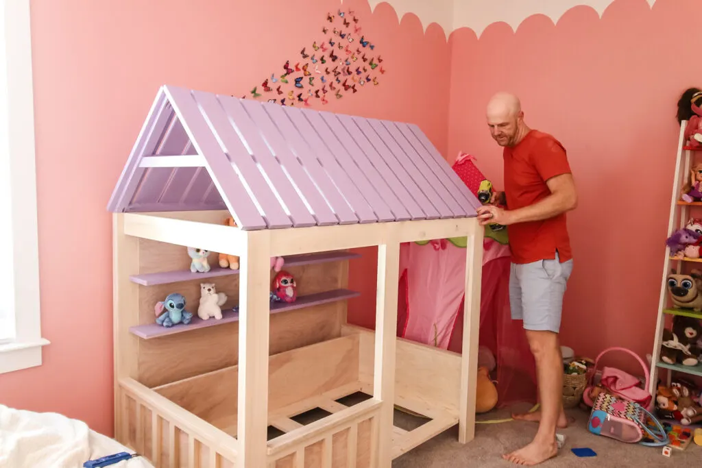 Attaching roof of house bed