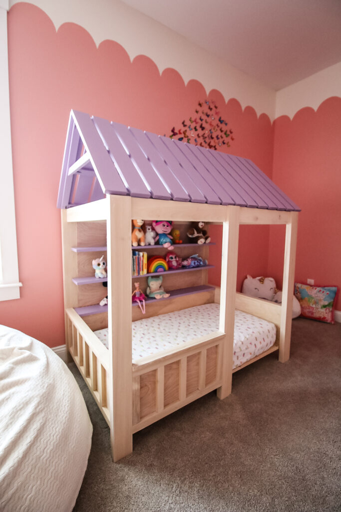 Tall view of kids house bed