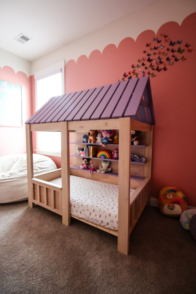 Tall view of kids house bed