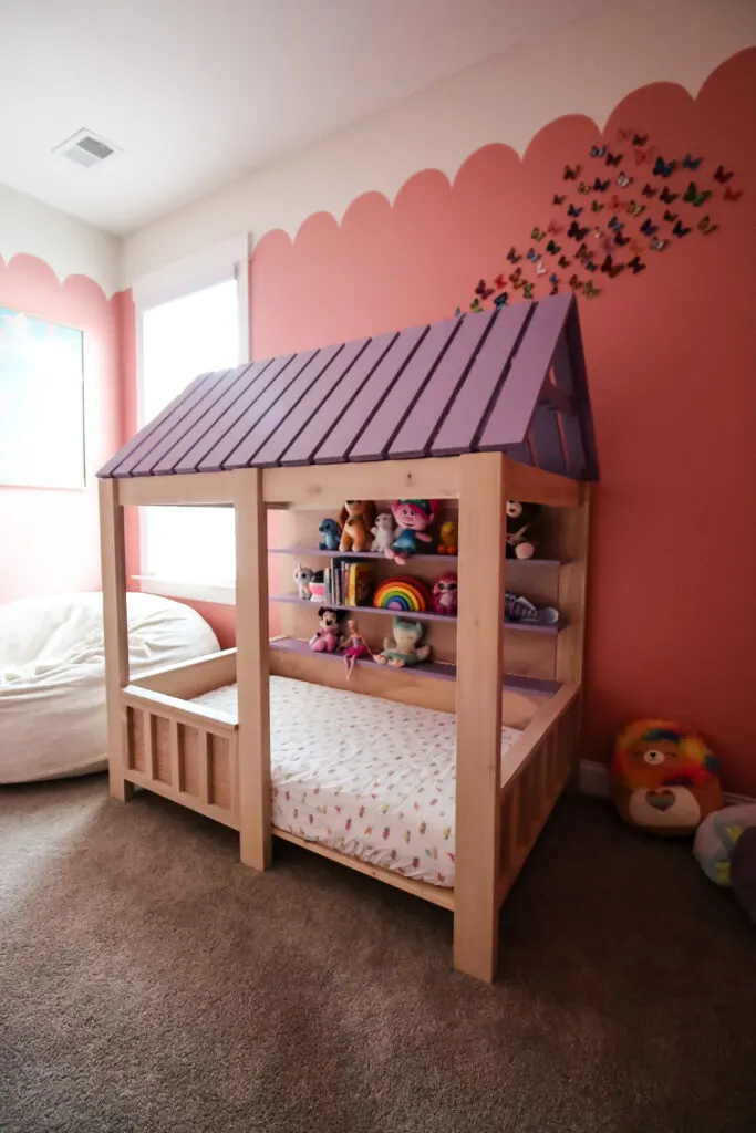 Tall view of kids house bed