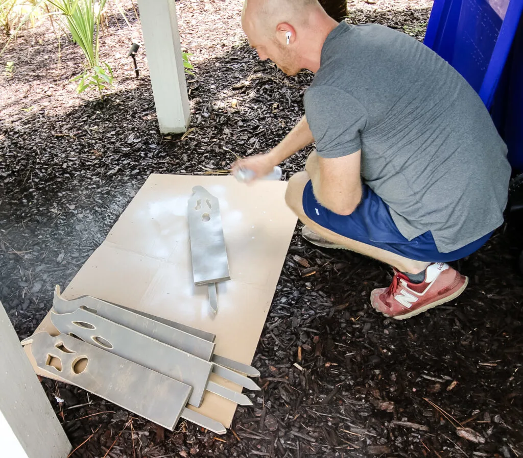 spray painting plywood ghosts