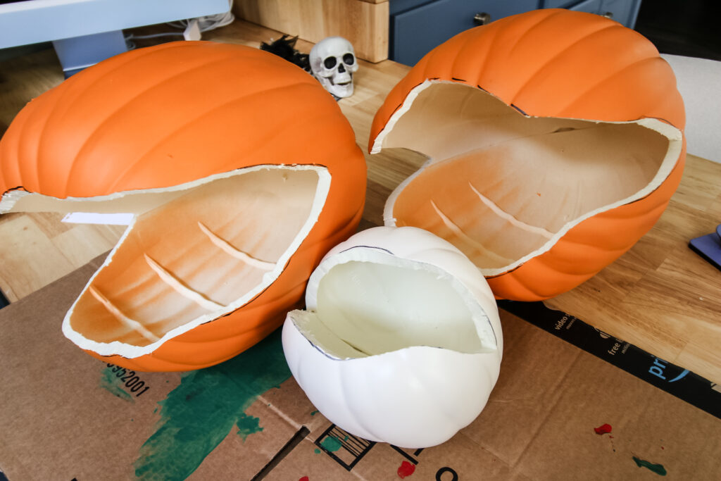 cutting pumpkins to make man eating pumpkins