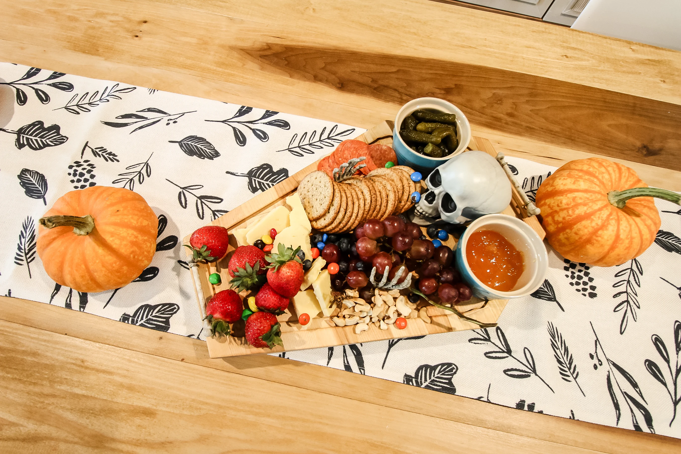 Skeleton cheeseboard with charcuterie