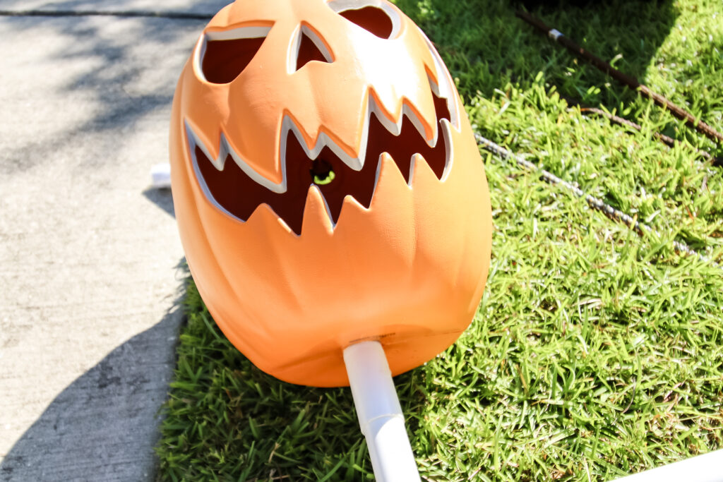 Attaching pumpkin head to PVC skeleton