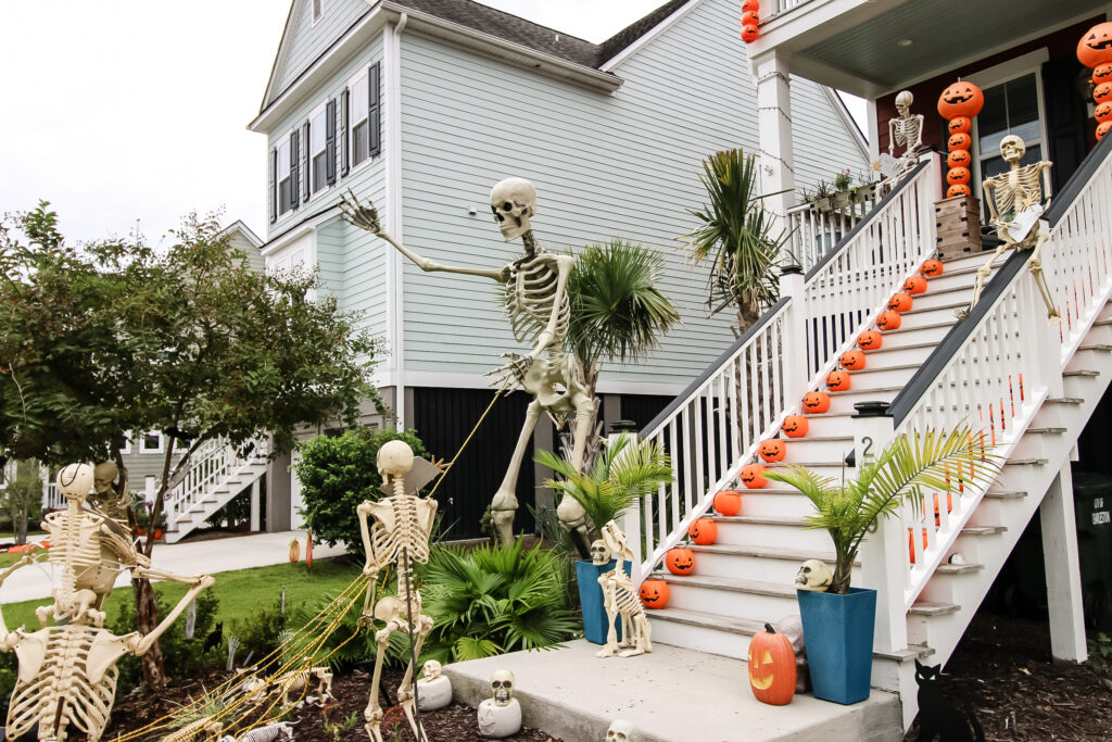 skeletons posed in the yard