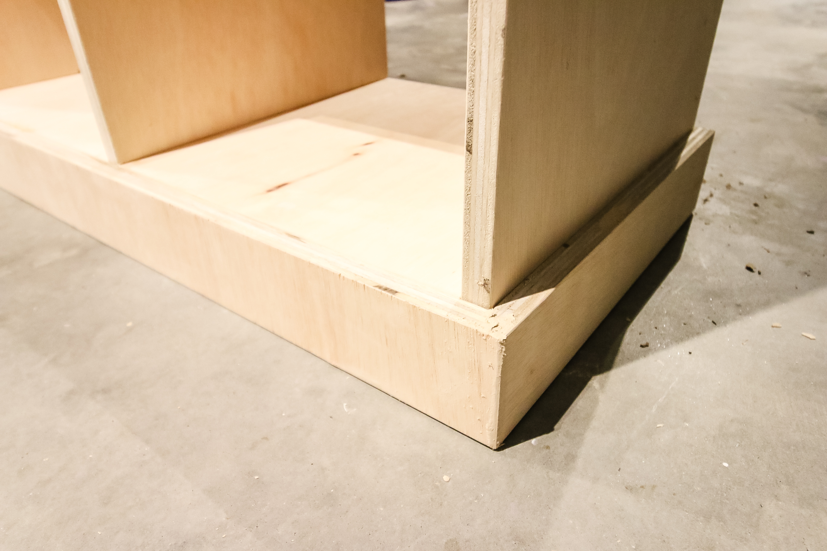 Lower trim on bookcase