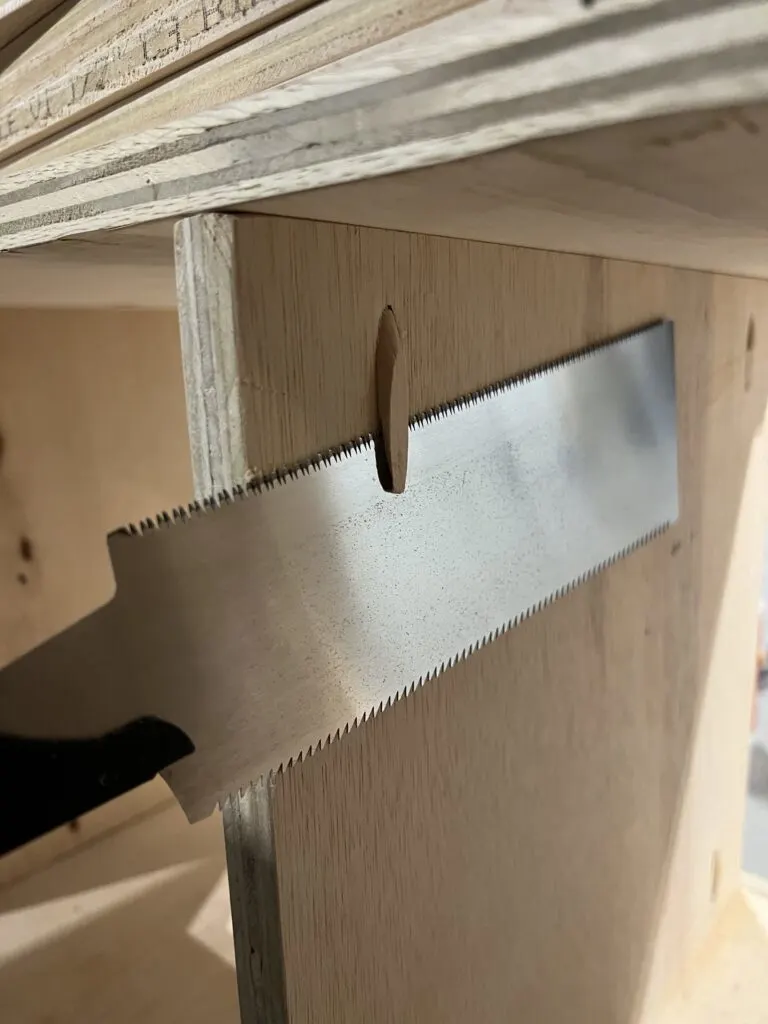 Trimming pocket hole plugs with flush cut saw