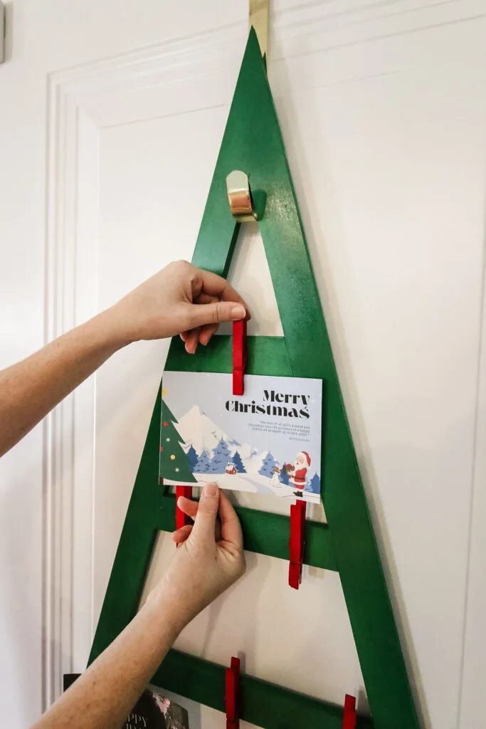 Attaching Christmas card to hanger