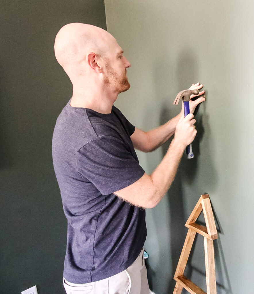 Hanging nails on wall for tree
