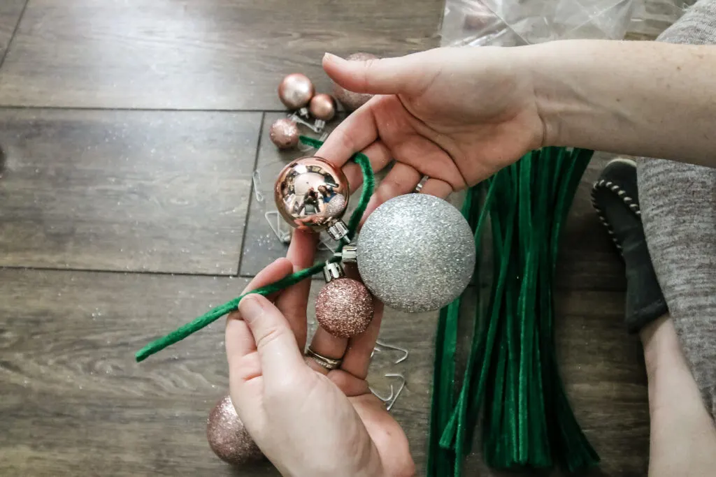ornaments strung onto a pipe cleaner