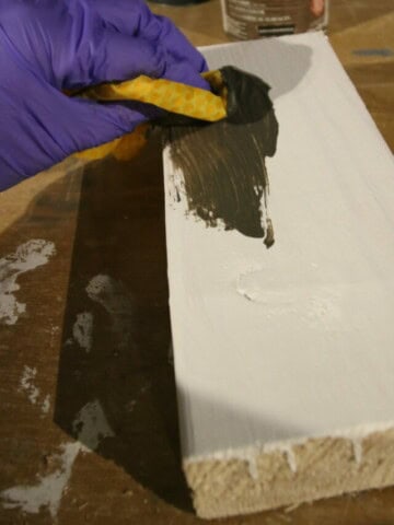 apply wood stain to wood board