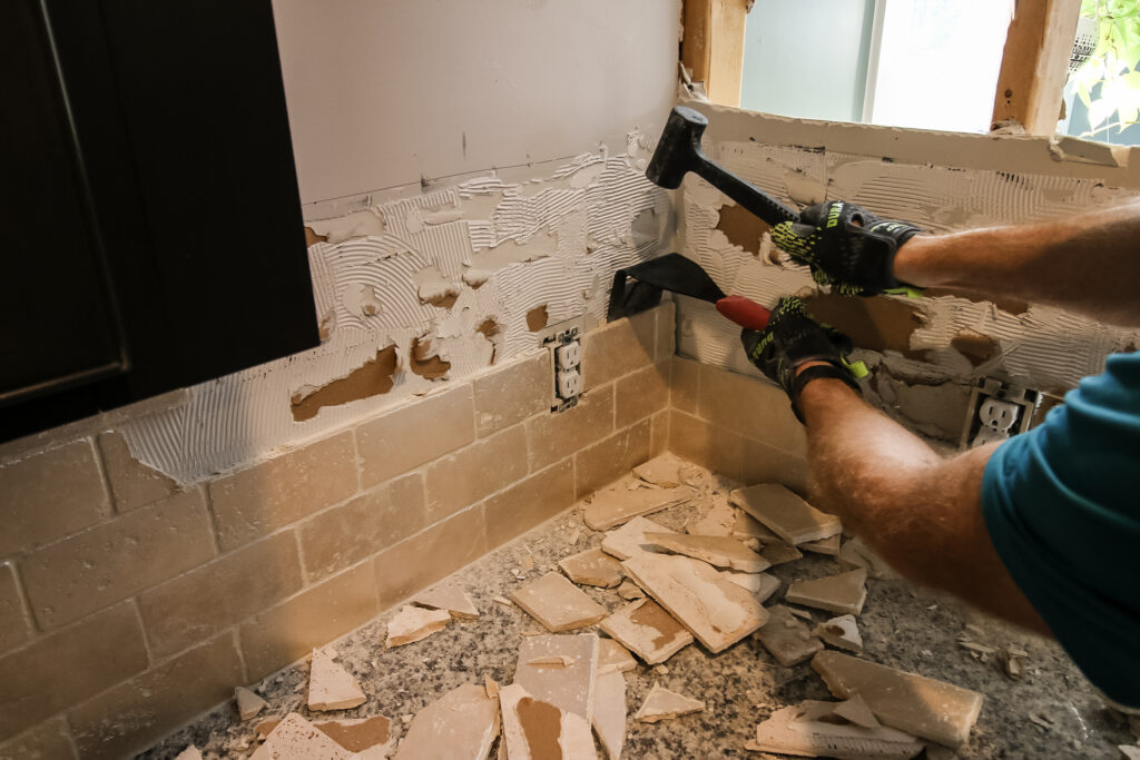 hammering trim puller to remove tile