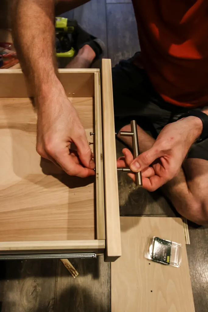 Attaching drawer face to drawer box