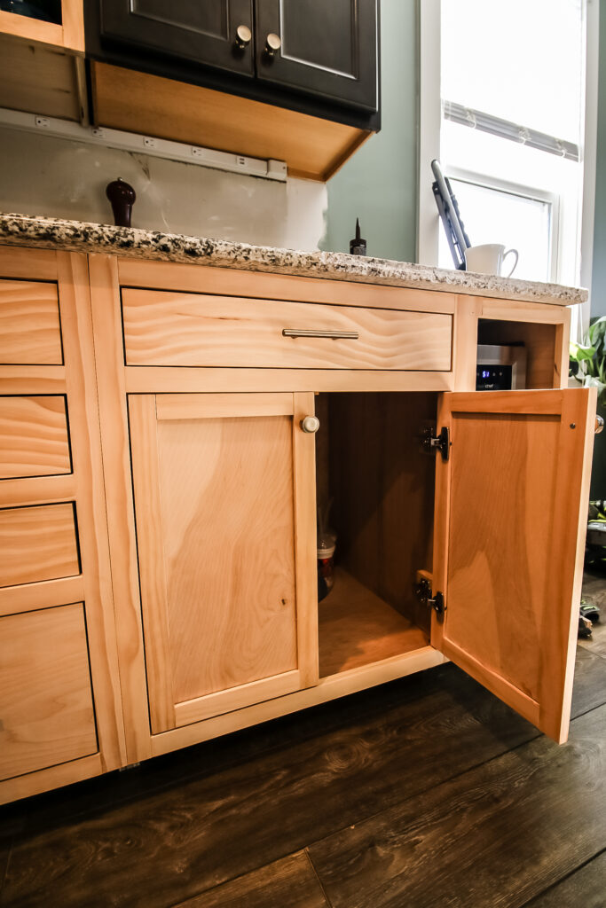 base cabinet with door open