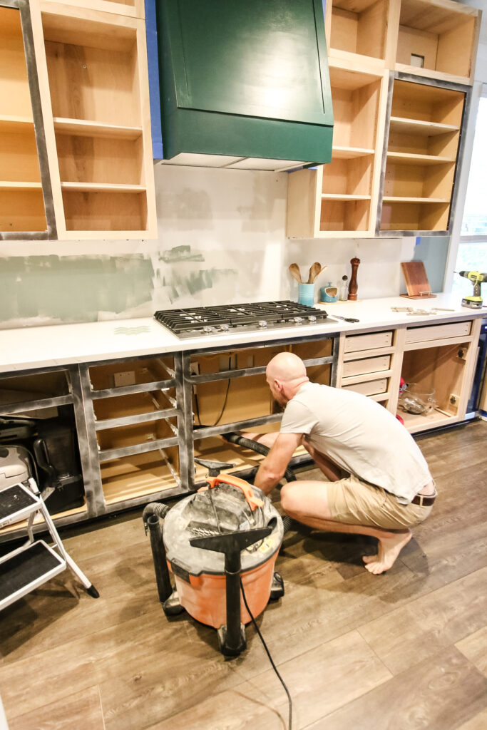 vacuum kitchen cabinets