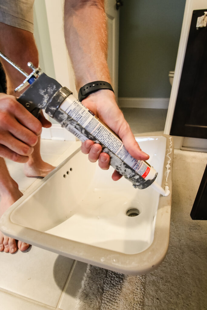 apply silicone to sink rim