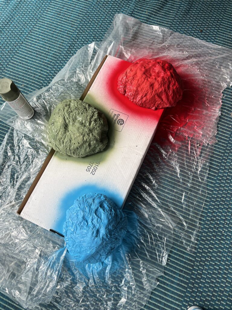 Spray first layer of paint
