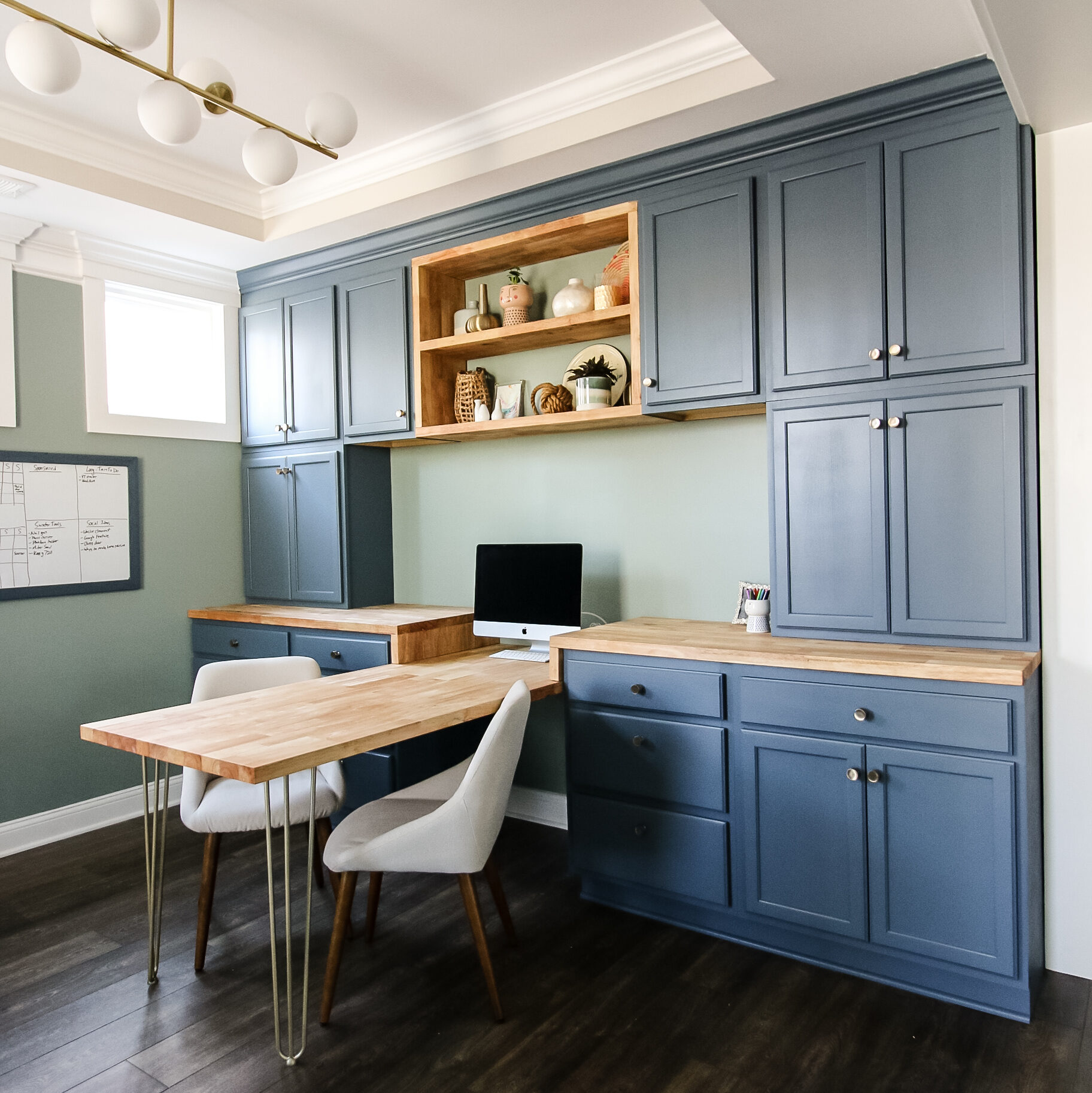 Wide view of DIY home office with butcher block desk