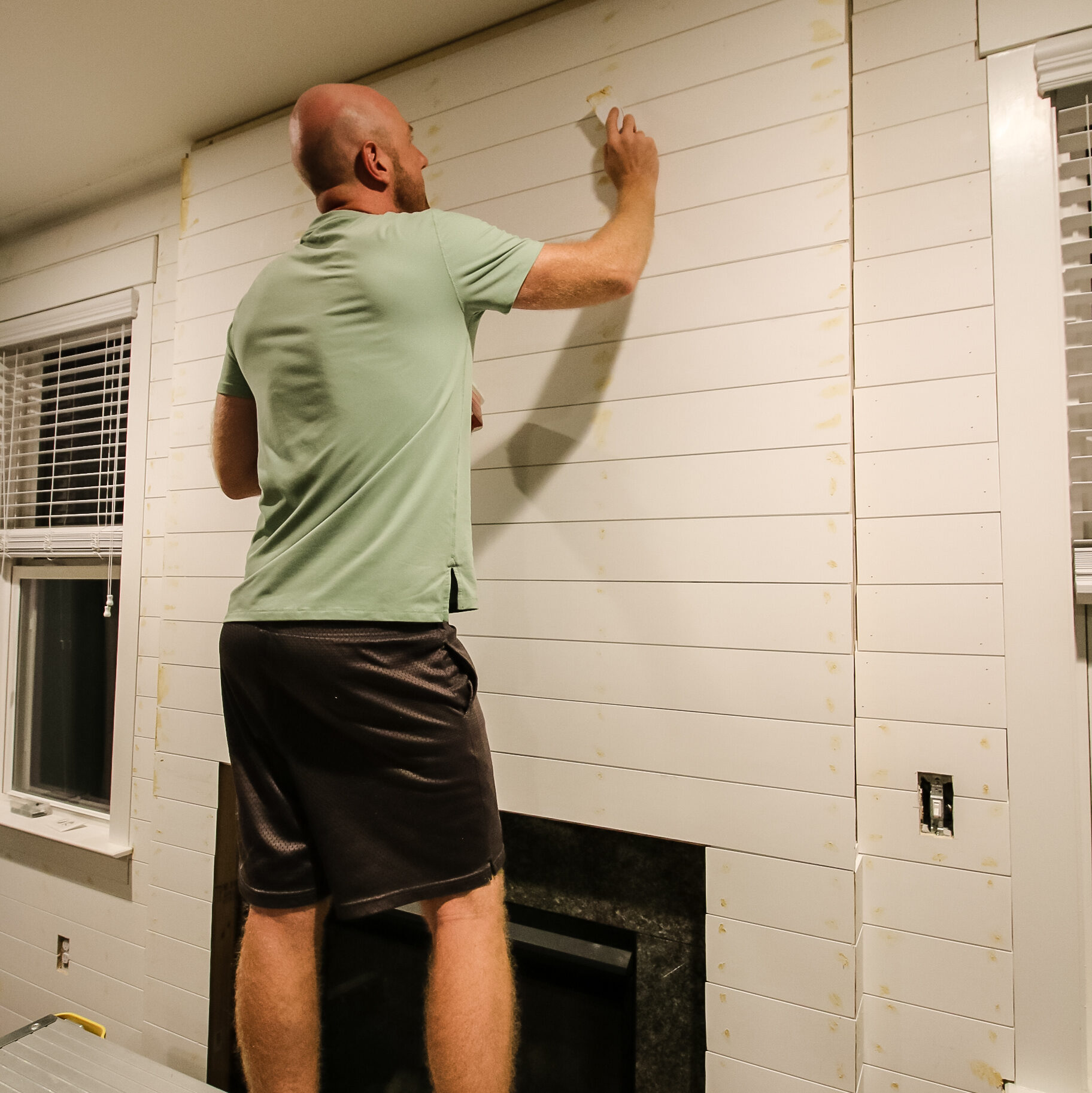 Adding wood filler to nail holes