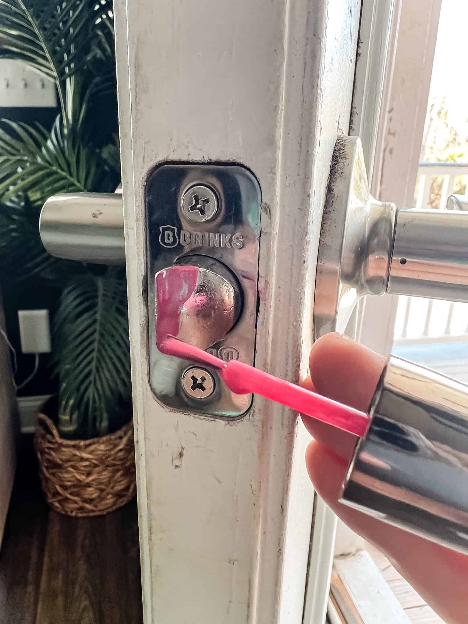 Painting nail polish on door latch