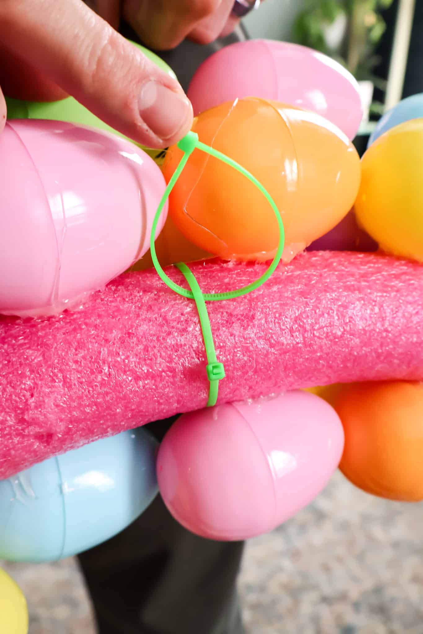zip tie hanger on the back of easter egg wreath