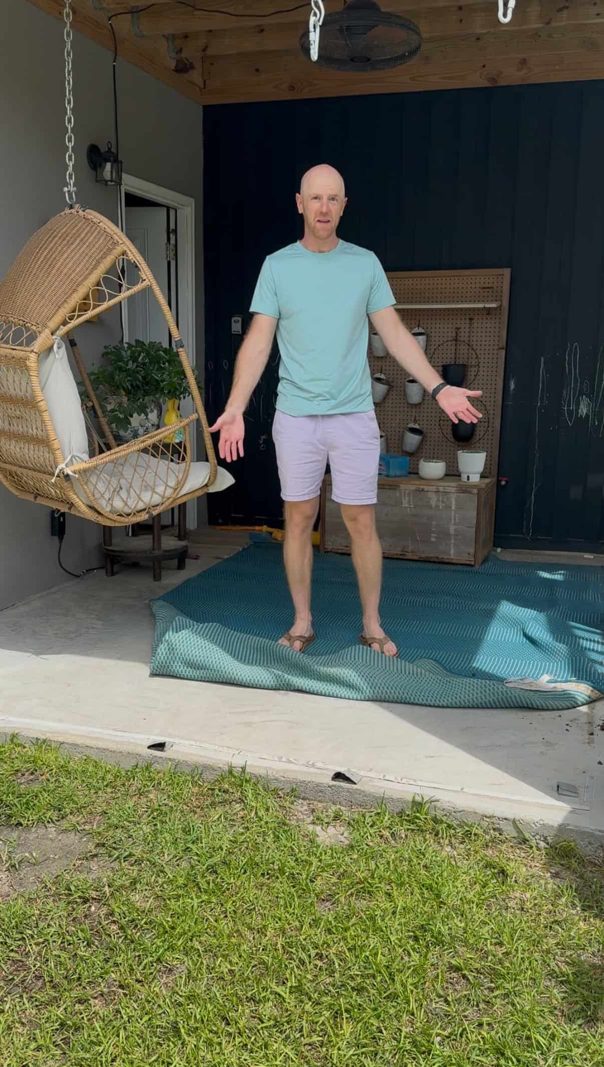 Outdoor rug curling in wind