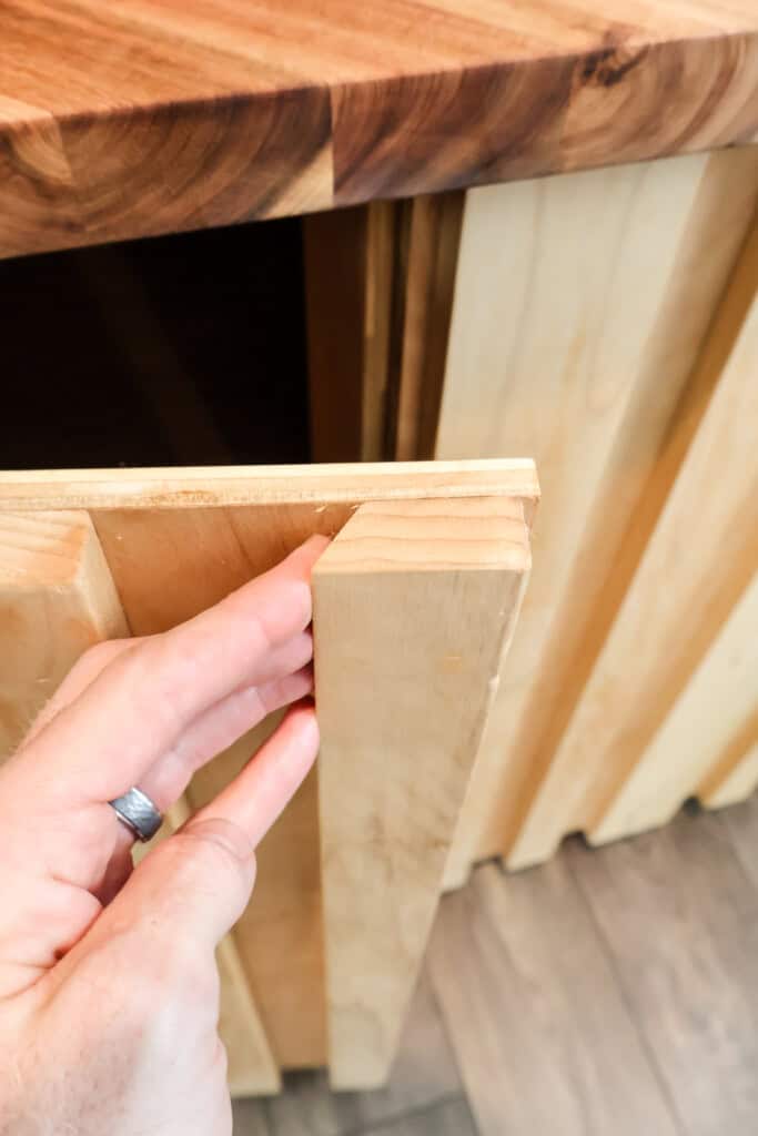 Chamfer edge on door for opening